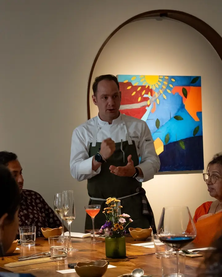 Jason hosting an Elizabeth dinner