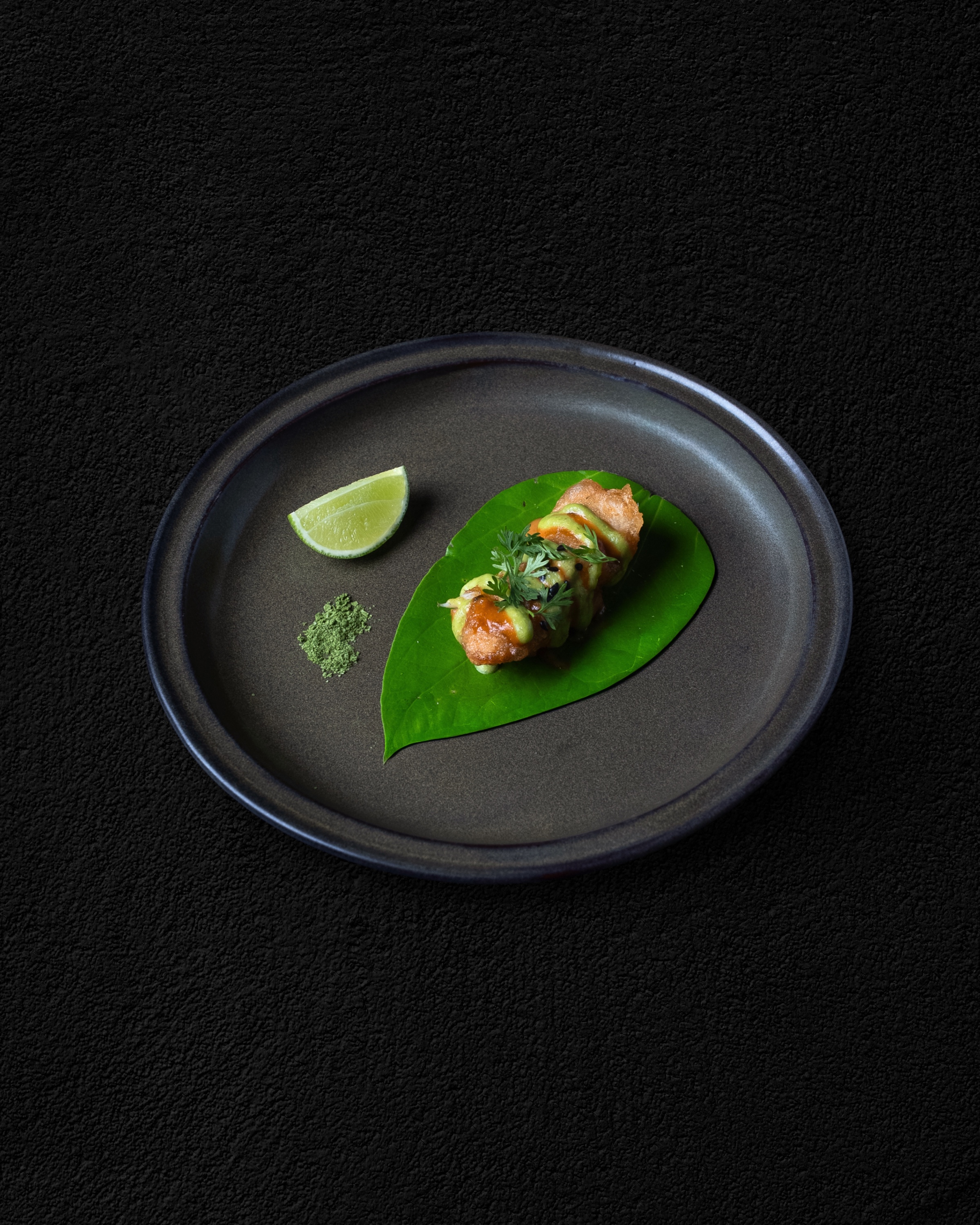 A plated roll on a green leaf