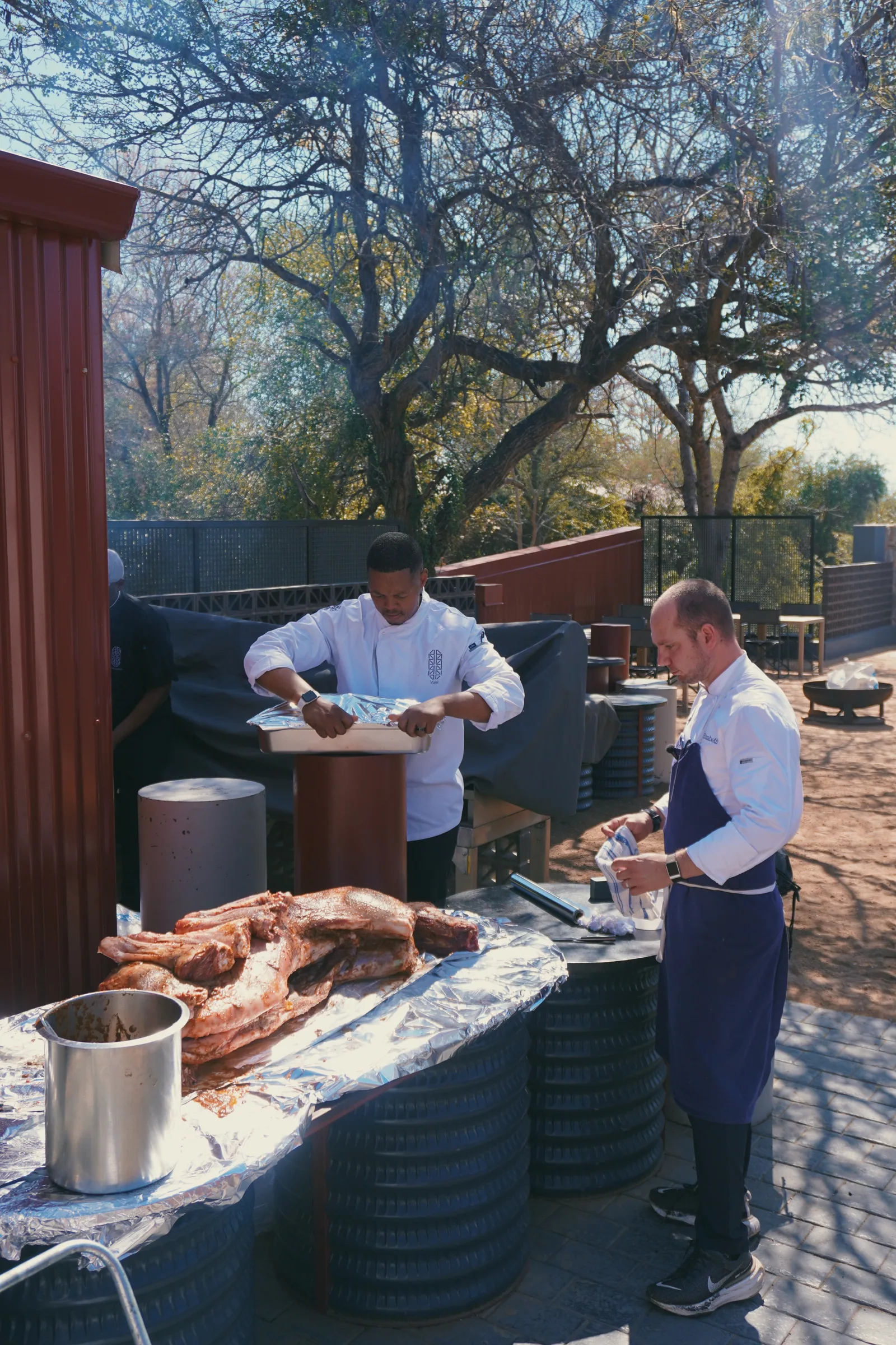 Jason cooking outside at Kruger Shalati
