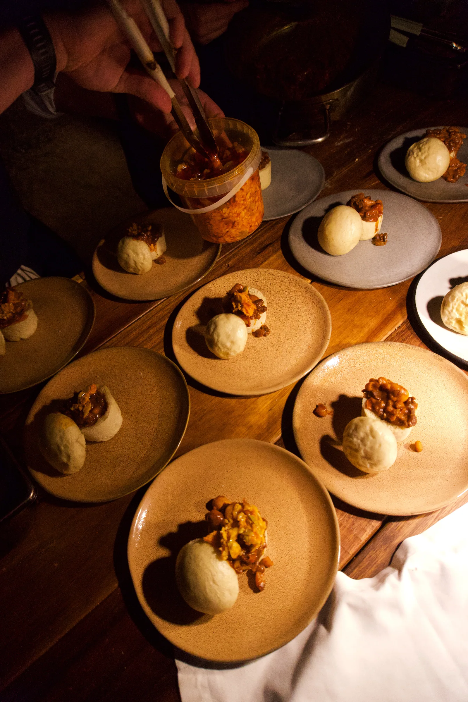 Dessert plates being finished for dinner at Few and Far Luvhondo