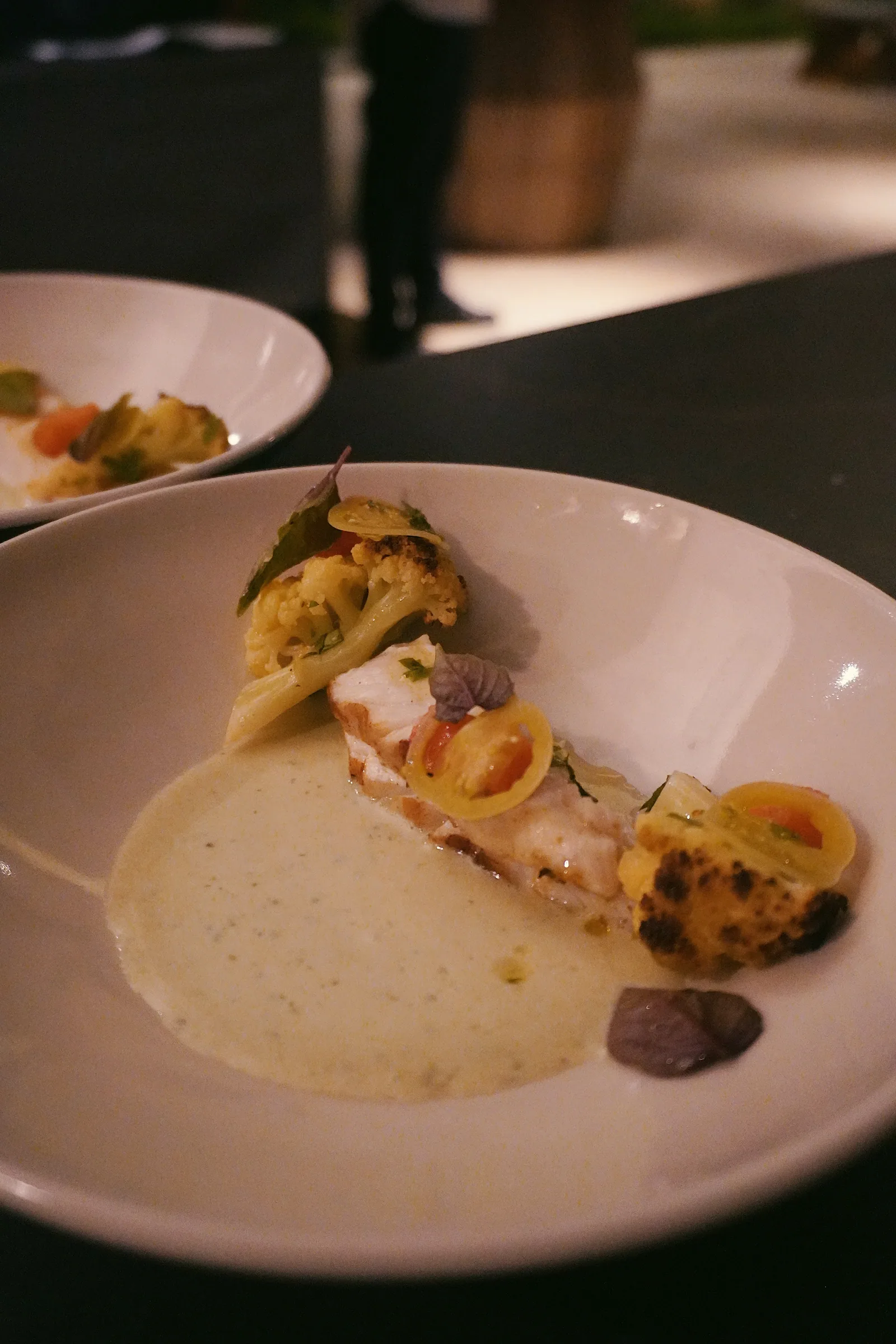 A composed fish course served at dinner in Sumba