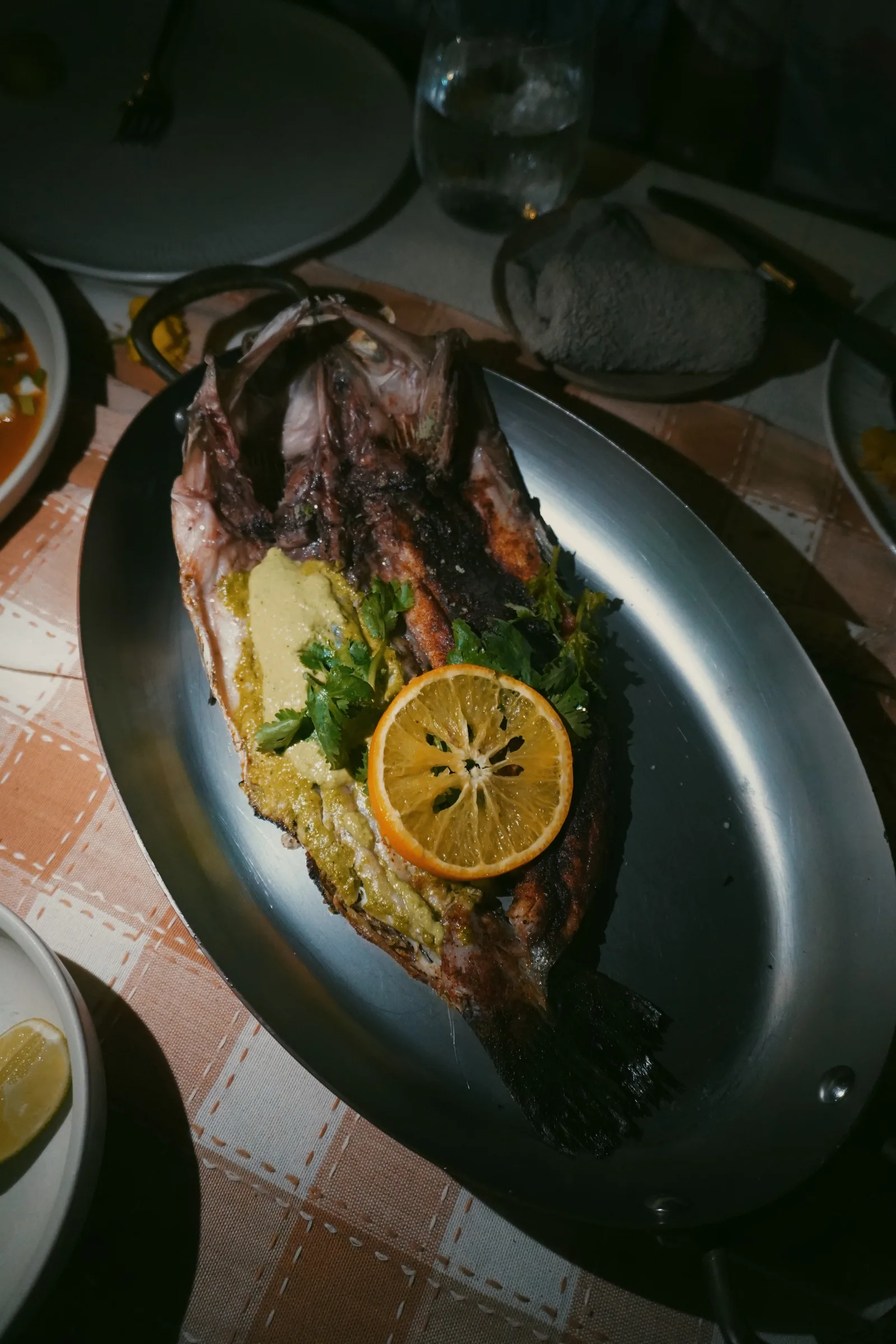 A whole grilled fish served at dinner in Sumba